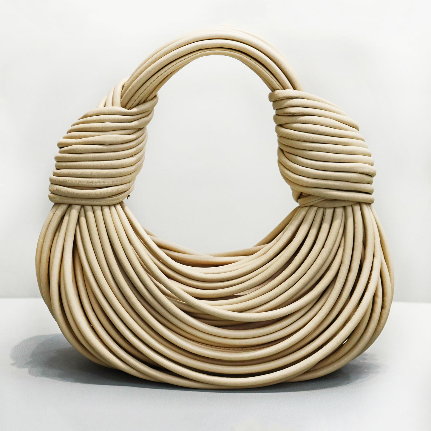 SPAGHETTI STRAP HANDBAG